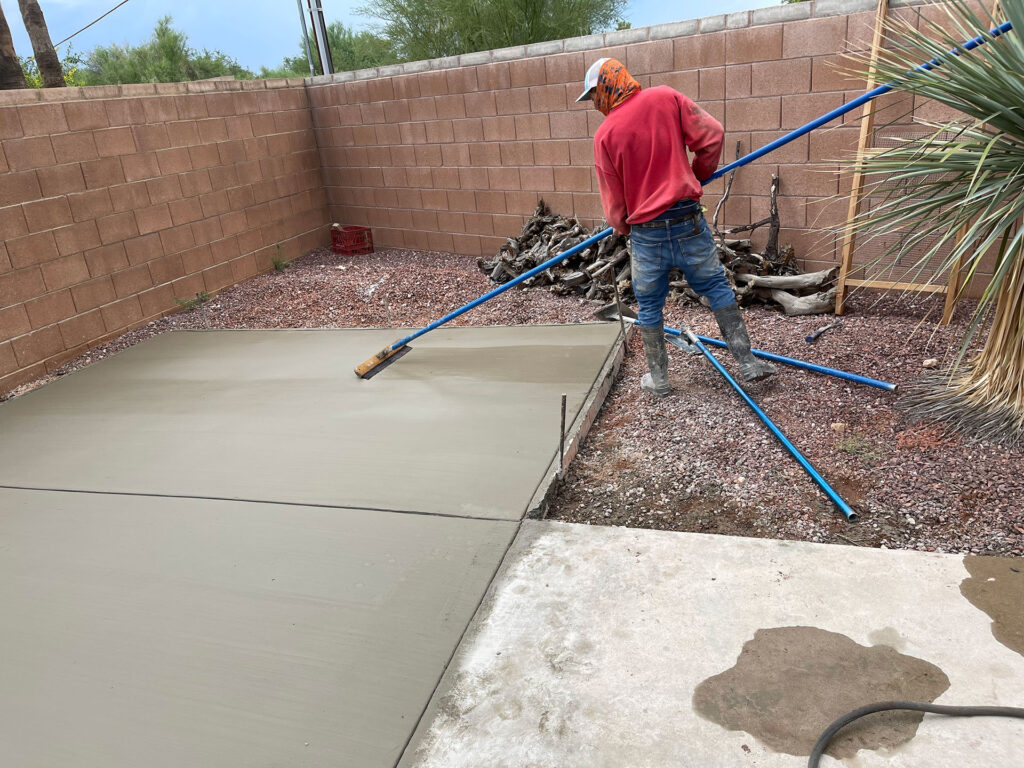 Concrete Contractor Finishing Back Patio